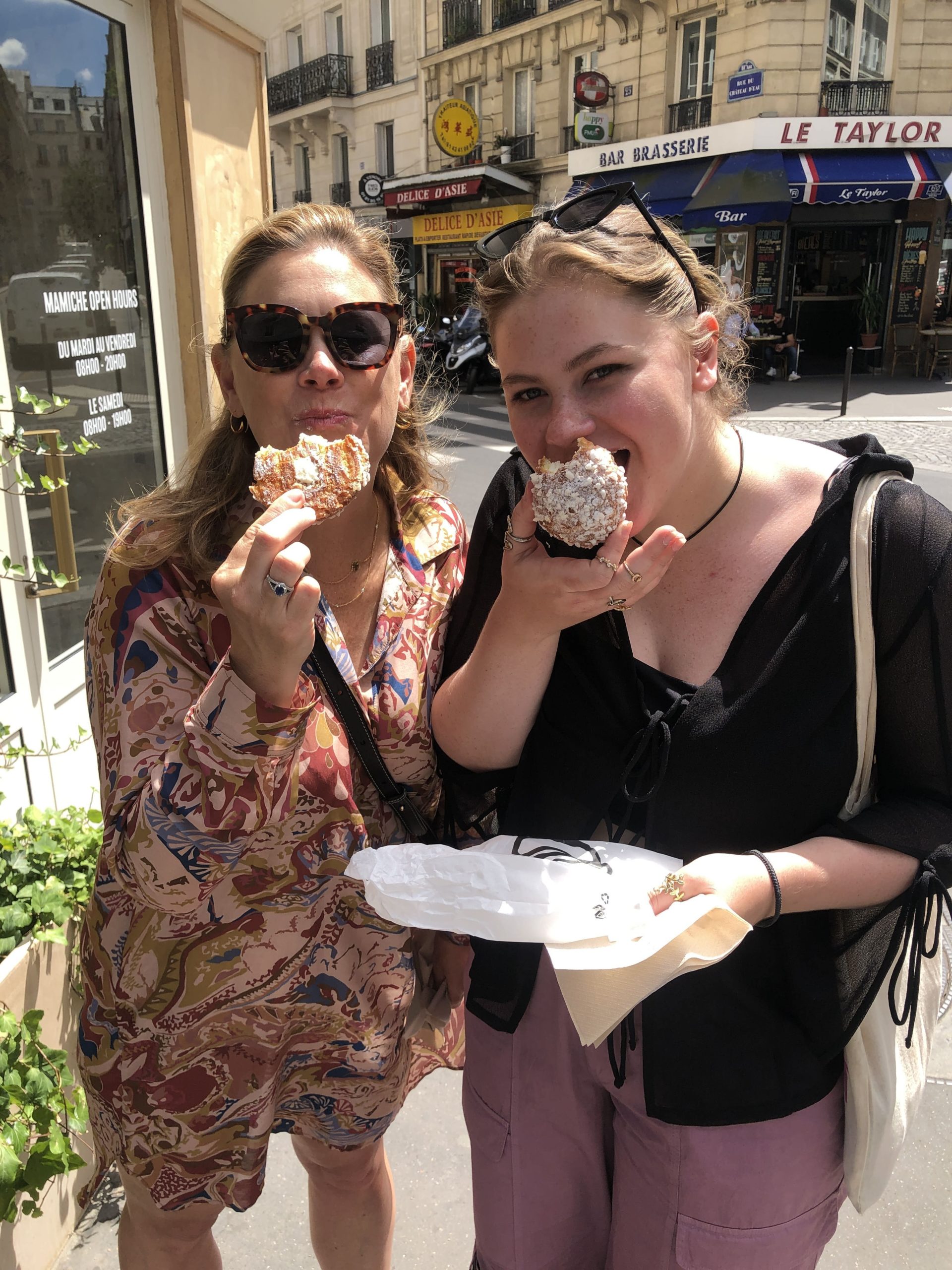 people eating pastries in paris